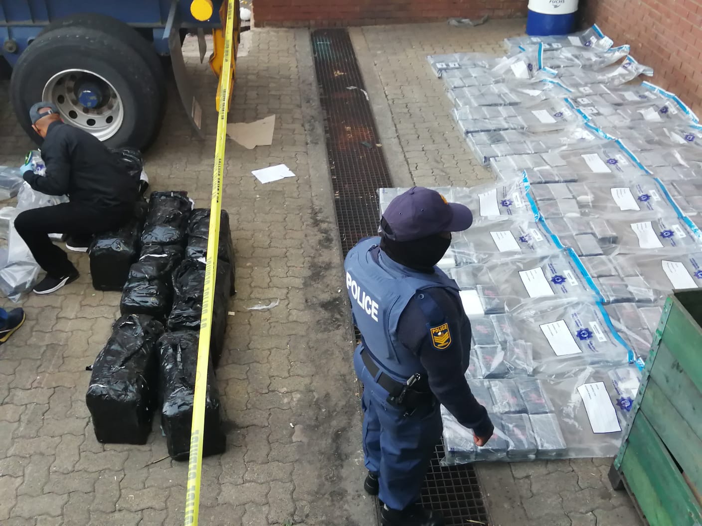 Police seized 552 bricks of cocaine, four vehicles, a grey BMW including three State vehicles - Gauteng